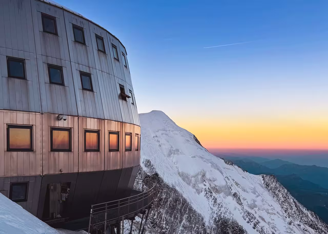 Stunning view of an alpine lodge with Mont Blanc at sunset in Saint-Gervais-les-Bains, France